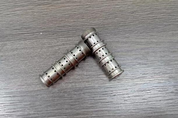 看高速磨粒流是怎么批量化給液壓零件內孔去毛刺的？